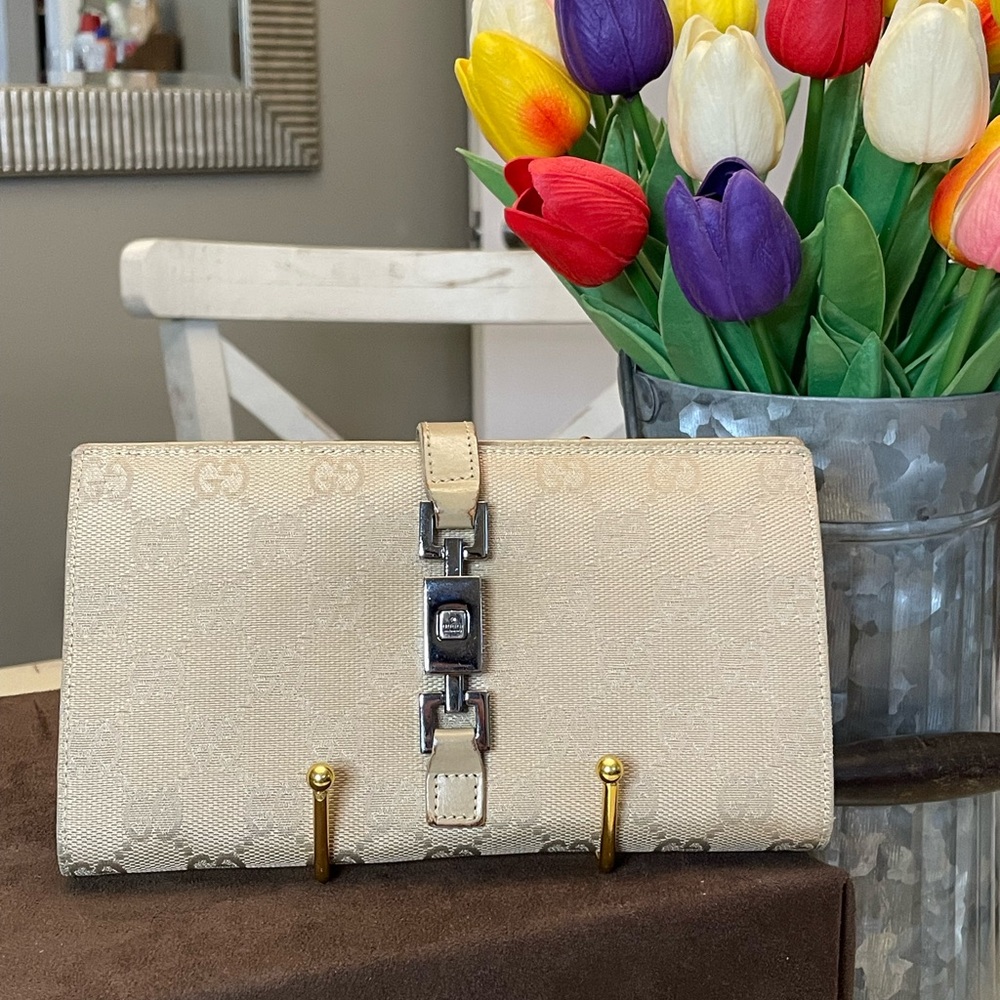 Gucci cream GG canvas wallet with piston clasp